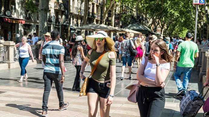Turistas internacionales en Barcelona.